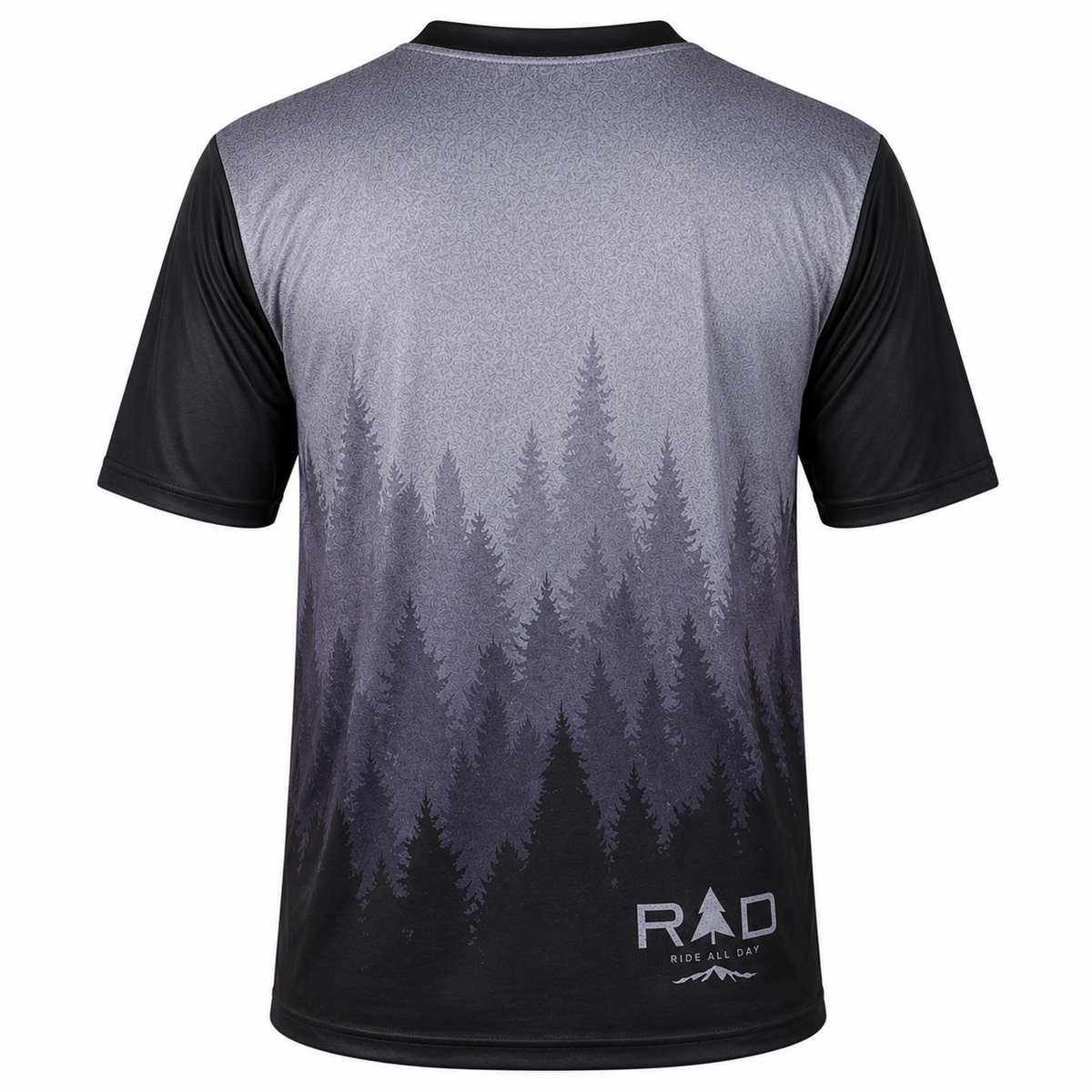 A short-sleeve cycling jersey shown from the back, featuring a gray-to-black gradient forest tree print and a white 'RAD' brand logo near the lower back, set against a black background.