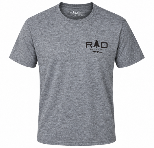 A heather gray short-sleeve crewneck t-shirt with a black 'RAD' logo printed on the left chest, displayed on a clean gray background.