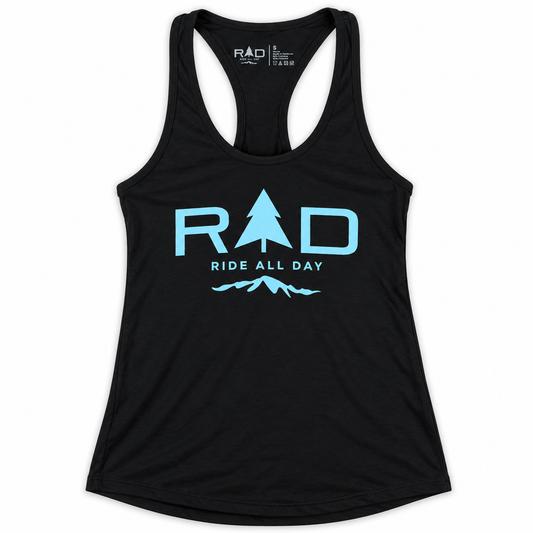A black racerback tank top featuring a light blue graphic on the front with the text 'RAD RIDE ALL DAY' and a pine tree and mountain design, displayed on a clean white background.